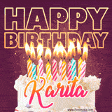 A colorful birthday cake topped with lit candles, with the words 'Happy Birthday Karita' in bold glowing letters on a burgundy background. Animated flames add a festive touch.
