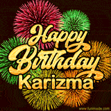 Golden text reading 'Happy Birthday Karizma' surrounded by vibrant fireworks in red, green, and yellow, set against a dark background in this celebratory birthday GIF.
