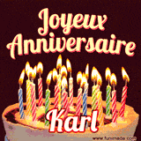 A Happy Birthday GIF in French featuring a festive birthday cake adorned with bright candles and the glowing text 'Joyeux Anniversaire Karl' in a cheerful style.