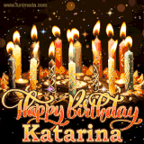 A glowing personalized birthday GIF with name Katarina featuring lit candles with intricate designs, warm lighting, and the text 'Happy Birthday' in an elegant font.