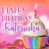 A vibrant birthday GIF featuring a rainbow-colored cupcake topped with white frosting, sprinkles, and a lit candle. The text reads 'Happy Birthday Katerinka' in bold pink and violet letters with white outline.