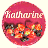 Beautifully decorated red velvet berry birthday cake with vibrant fruits and a glowing 'Katharine' name, adding a touch of sweetness and sparkle.