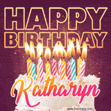A colorful birthday cake topped with lit candles, with the words 'Happy Birthday Katharyn' in bold glowing letters on a burgundy background. Animated flames add a festive touch.