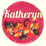 Beautifully decorated red velvet berry birthday cake with vibrant fruits and a glowing 'Katheryn' name, adding a touch of sweetness and sparkle.