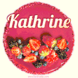 Beautifully decorated red velvet berry birthday cake with vibrant fruits and a glowing 'Kathrine' name, adding a touch of sweetness and sparkle.