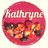 Beautifully decorated red velvet berry birthday cake with vibrant fruits and a glowing 'Kathryne' name, adding a touch of sweetness and sparkle.