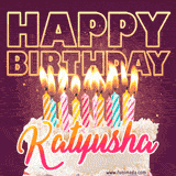 A colorful birthday cake topped with lit candles, with the words 'Happy Birthday Katyusha' in bold glowing letters on a burgundy background. Animated flames add a festive touch.