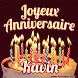 A Happy Birthday GIF in French featuring a festive birthday cake adorned with bright candles and the glowing text 'Joyeux Anniversaire Kavin' in a cheerful style.