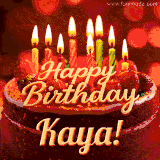 Beautifully decorated red velvet berry birthday cake with vibrant fruits and a glowing 'Kaya' name, adding a touch of sweetness and sparkle.