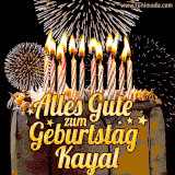 A chocolate birthday cake with glowing candles, the German text 'Alles Gute zum Geburtstag Kayal,' and vibrant fireworks lighting up the background in an animated GIF.
