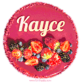 Beautifully decorated red velvet berry birthday cake with vibrant fruits and a glowing 'Kayce' name, adding a touch of sweetness and sparkle.