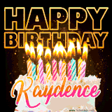 A vibrant animated GIF featuring a delicious birthday cake topped with glowing candles and the name 'Kaydence' in elegant script, and the words 'Happy Birthday' on the black background.