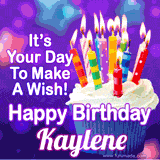 A colorful birthday GIF for Kaylene featuring a cupcake with vibrant lit candles and the text 'It's Your Day to Make a Wish! Happy Birthday Kaylene' in bold letters on a festive purple background.