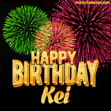 A captivating GIF with bursts of green, pink, and orange fireworks lighting up the night sky, accompanied by 'Happy Birthday Kei' in glowing golden text.