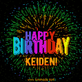 A colorful animated GIF featuring the text 'Happy Birthday Keiden!' in rainbow colors with a dynamic iridescent firework display in the background.