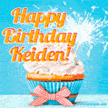 A cheerful animated GIF of a cupcake with creamy frosting, a red checkered ribbon, and a bright sparkler on top. The text 'Happy Birthday Keiden!' is displayed in vibrant orange and red.