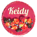 Beautifully decorated red velvet berry birthday cake with vibrant fruits and a glowing 'Keidy' name, adding a touch of sweetness and sparkle.