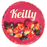 Beautifully decorated red velvet berry birthday cake with vibrant fruits and a glowing 'Keilly' name, adding a touch of sweetness and sparkle.