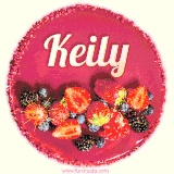 Beautifully decorated red velvet berry birthday cake with vibrant fruits and a glowing 'Keily' name, adding a touch of sweetness and sparkle.