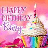 A vibrant birthday GIF featuring a rainbow-colored cupcake topped with white frosting, sprinkles, and a lit candle. The text reads 'Happy Birthday Keiry' in bold pink and violet letters with white outline.