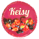 Beautifully decorated red velvet berry birthday cake with vibrant fruits and a glowing 'Keisy' name, adding a touch of sweetness and sparkle.