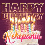 A colorful birthday cake topped with lit candles, with the words 'Happy Birthday Kekepania' in bold glowing letters on a burgundy background. Animated flames add a festive touch.