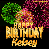 A captivating GIF with bursts of green, pink, and orange fireworks lighting up the night sky, accompanied by 'Happy Birthday Kelsey' in glowing golden text.