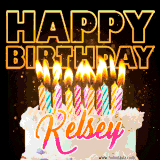 A vibrant animated GIF featuring a delicious birthday cake topped with glowing candles and the name 'Kelsey' in elegant script, and the words 'Happy Birthday' on the black background.