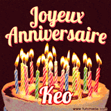 A Happy Birthday GIF in French featuring a festive birthday cake adorned with bright candles and the glowing text 'Joyeux Anniversaire Keo' in a cheerful style.