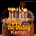 A rich chocolate cake topped with glowing birthday candles and surrounded by bright fireworks. The animated GIF displays the message 'Happy Birthday Keron' in golden text.