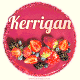 Beautifully decorated red velvet berry birthday cake with vibrant fruits and a glowing 'Kerrigan' name, adding a touch of sweetness and sparkle.