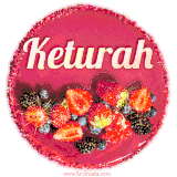Beautifully decorated red velvet berry birthday cake with vibrant fruits and a glowing 'Keturah' name, adding a touch of sweetness and sparkle.