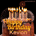 A rich chocolate cake topped with glowing birthday candles and surrounded by bright fireworks. The animated GIF displays the message 'Happy Birthday Kevion' in golden text.