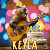 Animated birthday GIF showing a capybara playing guitar and singing beside a birthday cake with the name Keyla in large letters and colorful bokeh lights in the background.