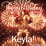 White elegant script spelling Keyla across a luxury gift box with a large golden bow.