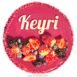 Beautifully decorated red velvet berry birthday cake with vibrant fruits and a glowing 'Keyri' name, adding a touch of sweetness and sparkle.