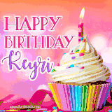 A vibrant birthday GIF featuring a rainbow-colored cupcake topped with white frosting, sprinkles, and a lit candle. The text reads 'Happy Birthday Keyri' in bold pink and violet letters with white outline.