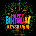 A colorful animated GIF featuring the text 'Happy Birthday Keyshawn!' in rainbow colors with a dynamic iridescent firework display in the background.