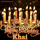 A glowing personalized birthday GIF with name Khai featuring lit candles with intricate designs, warm lighting, and the text 'Happy Birthday' in an elegant font.