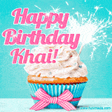 A festive cupcake with pink icing, a gingham bow, and a lit animated sparkler, paired with 'Happy Birthday Khai!' in bright pink text.