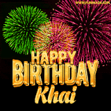 A captivating GIF with bursts of green, pink, and orange fireworks lighting up the night sky, accompanied by 'Happy Birthday Khai' in glowing golden text.