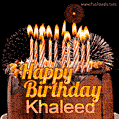 A rich chocolate cake topped with glowing birthday candles and surrounded by bright fireworks. The animated GIF displays the message 'Happy Birthday Khaleed' in golden text.