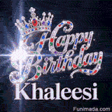A detailed silver queen crown with colorful gemstone highlights resting on diamond-encrusted cursive letters.Khaleesi