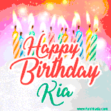 Bright birthday candles with rainbow flames on a cake, alongside the text 'Happy Birthday Kia' in vibrant script in this celebratory animated GIF.