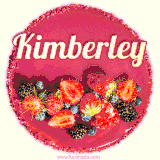 Beautifully decorated red velvet berry birthday cake with vibrant fruits and a glowing 'Kimberley' name, adding a touch of sweetness and sparkle.