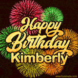 Golden text reading 'Happy Birthday Kimberly' surrounded by vibrant fireworks in red, green, and yellow, set against a dark background in this celebratory birthday GIF.