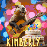 Animated birthday GIF showing a capybara playing guitar and singing beside a birthday cake with the name Kimberly in large letters and colorful bokeh lights in the background.