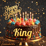 Burning birthday candles on top of a chocolate drip cake decorated with colorful icing dollops and sprinkles for King.