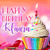 A vibrant birthday GIF featuring a rainbow-colored cupcake topped with white frosting, sprinkles, and a lit candle. The text reads 'Happy Birthday Klaara' in bold pink and violet letters with white outline.