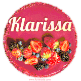 Beautifully decorated red velvet berry birthday cake with vibrant fruits and a glowing 'Klarissa' name, adding a touch of sweetness and sparkle.